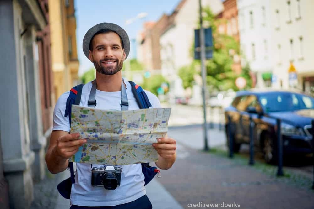 man traveling Europe with map